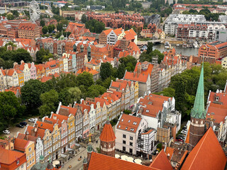 Stunning view from above of Gdańsk old town with multicolored beautiful architecture buildings and...