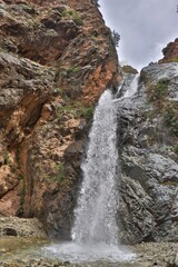 Fototapeta na wymiar Waterfall in the mountains of Tajakistan, Tien Shan