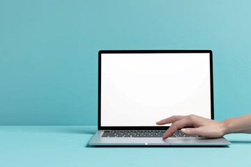 Fototapeta premium 3D Computer laptop with hand finger presses on keyboard button. 