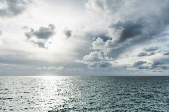 Landscape shot of North Sea and incredible sky with clouds and light. North Sea, Germany