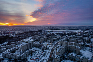 Obraz premium Aerial winter morning view of beautiful clouds sky in Fabijoniškės and Šeškinė district in Vilnius, Lithuania