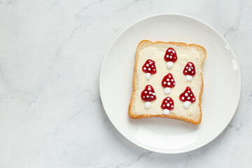 food art idea, toast with butter and strawberry jam