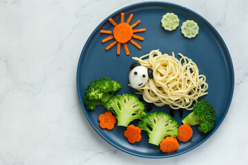Funny kids food idea, cute sheep made of spaghetti pasta - 729368118