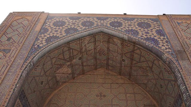 top of an archway in ancient mosque in Registan Square in Samarkand, Uzbekistan along the historic Silk Road