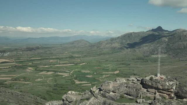 Rocks and cross on mountain near Prilep drone shooting 