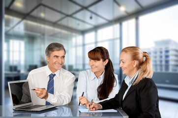 Group of happy business colleagues in modern co working
