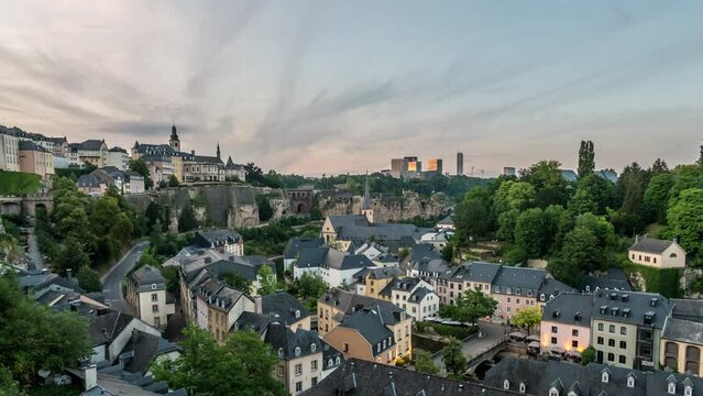 Grand Duchy of Luxembourg time lapse, day to night city skyline at Grund along Alzette river in the historical old town of Luxembourg