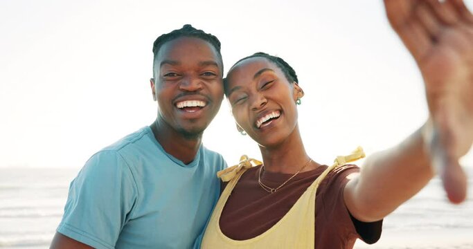 Selfie, love and happy black couple at a beach for summer, travel or bonding on romantic date at sunset. Hands, photography and African people hug for profile picture, memory or adventure in Miami