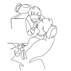 dentist treating woman's teeth