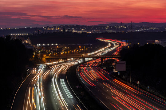Elevated view of the AP-7 motorway at dusk as it passes through Mollet del Valles in the province of Barcelona in Catalonia Spain