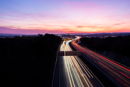 Elevated view of the AP-7 motorway at dusk as it passes through Mollet del Valles in the province of Barcelona in Catalonia Spain