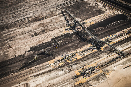 Aerial landscape of coal strip mine and large mining equipment. Welzow, Germany