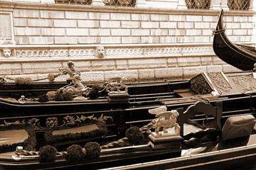 Italy. Venice. Details of typical venitian gondolas. . In Sepia toned. Retro style