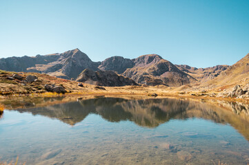 Fototapeta na wymiar lake reflection in the mountain