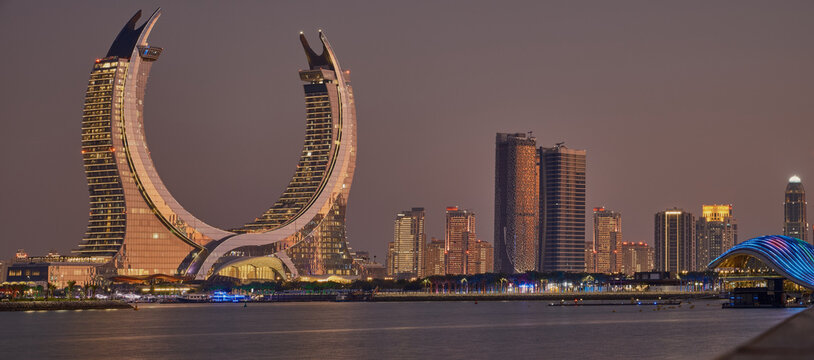 Lusail skyline Lusail city, Qatar including Katara Towers project from Lusail marina night shoot .Construction industry concept.