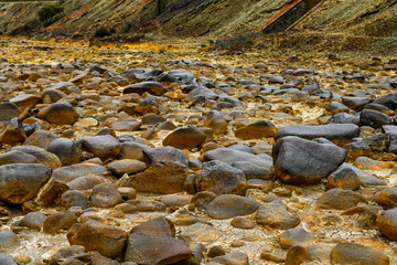 Sulfuric Terrain and Riverbed Rocks at Rio Tinto
