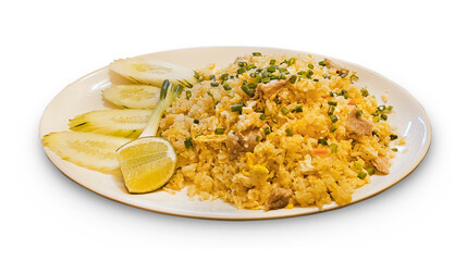 Photo Pork fried rice served with cucumber, lime and onion green