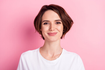 Photo portrait of woman with bob hair smiling isolated on pastel pink color background