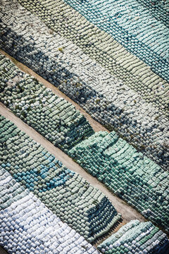 Aerial view of huge recycling depot with huge balls of plastic to be recycled.