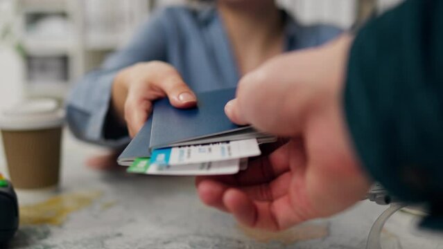 In an authentic office space of a travel agency, an experienced consultant with a mood issues plane tickets, a middle manager prepares a summer trip for clients who have planned a summer vacation