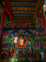 Ancient thangka or mural wall painting of Shakyamuni Buddha on the wall of Maitreya shrine, Tsemo fort, Leh Ladakh.  