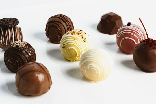 variety of french chocolates on white tray