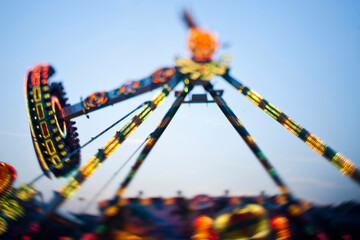 colorful bright ferris wheel ride at a folk festival