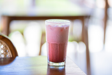 Red Velvet Drinks Milk in a Glass. Fresh Drink Smoothie Concept to Go. My favorite drink at the cafe