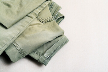 Worn out old cargo pants. Recycling of used clothes.