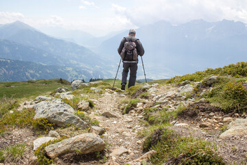 man trekking in the mountains, Alps in Austria, Lienzer Dolomiten, East Tyrol