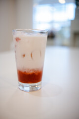 glass of Strawberry latte with ice