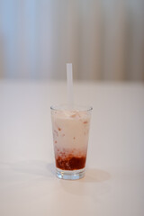 glass of Strawberry latte with ice