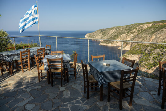 Greek tavern on Viewpoint of Cliffs in Kambi in Zakinthos Greece Island. Wild cliffs of the western Zakynthos. Beautiful cliff coast on greek island.