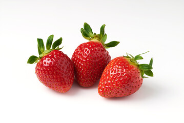 Three red strawberries on a white background