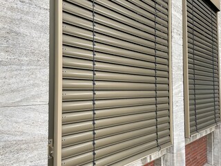 windows with lowered shutters
