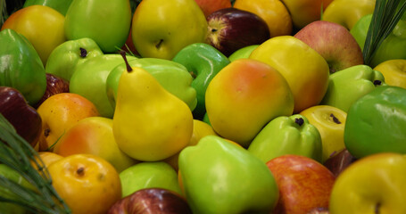 Apples and pears. A vivid close-up of colorful fruits. Ideal for the concept of a healthy lifestyle