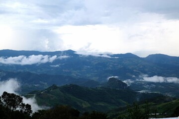 Fototapeta na wymiar clouds over the mountain, Doi Phayapipak, Chiang Rai, Thailand 