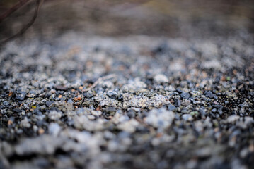 Photo of crushed stones blurred background. - obrazy, fototapety, plakaty