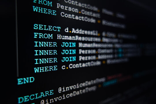 Developer or Programmer's text editor showing SQL (Structured Query Language) code on computer monitors. SQL Programming language concept, Computer courses, Training, Learning, Database Backup, DBMS.