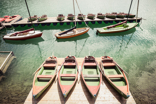 Row boats on the dock of a lake. Walchensee, Germany