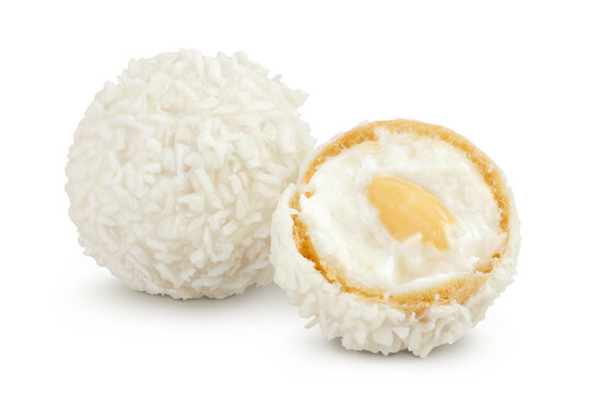 round candy raffaello with coconut flakes and nut isolated on white background
