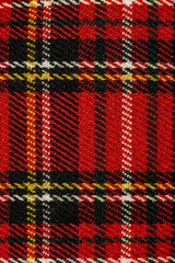 Red Scottish tartan texture background detail kilt traditional costume