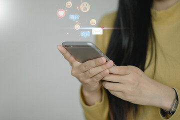 Young businesswoman using smart phone ,Social, media, Marketing concept.  smartphone for social media marketing and online advertising. Digital concept.