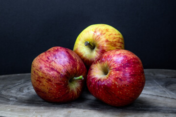 Close up of three red apples