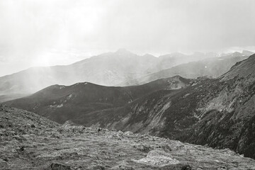 Classic black and white Rocky Mountain panoramic landscape of approaching snowstorm in Colorado, USA