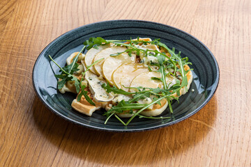 Waffles Pear cheese on a blue plate