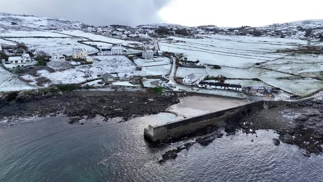 Aerial view ofa snow covered Portnoo harbour in County Donegal, Ireland.