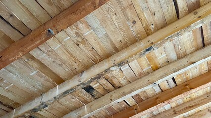 New wooden ceiling on the new house built in progress. Wooden construction upon the first floor.