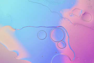 Iridescent colorful abstract background with bubbles, fluid texture pastel tones curvy wavy good vibes