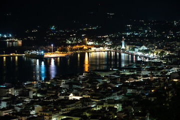  Zakynthos town city at night.  Harbor of  Zakynthos town seen from bochali view point, Greece. Night Panorama of the Zante Zakynthos town in Greece.
